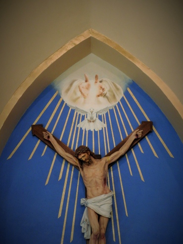 Above the crucifix