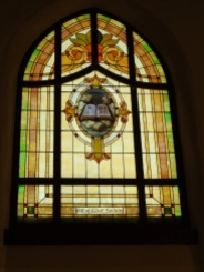 Stained glass in back of church